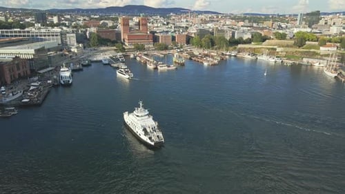 Large yachts approach the marina of Pipervika in Oslo Norway