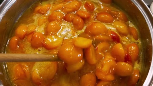 Simmering Apricot Slices for Sweet Homemade Jam