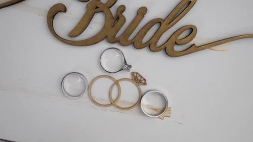 Wedding Rings and Bride Sign Flat Lay