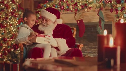 Santa Claus with Child holding Christmas Gift