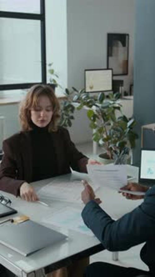 Business Meeting: Woman and Man at Workplace