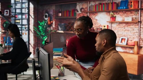 IT Coworkers Programming in AI Startup Office