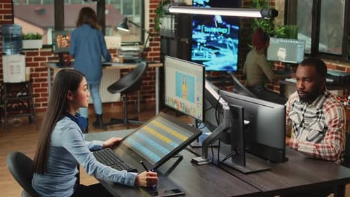 Creative Team Collaborating in Open Office Environment