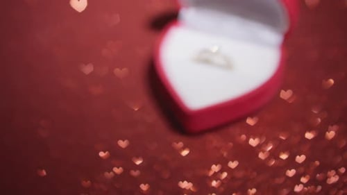 Engagement Ring in Heart Box with Bokeh Background