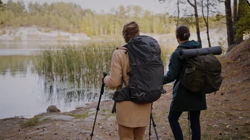 Young Married Pair Enjoying Weekend Retreat in Forest