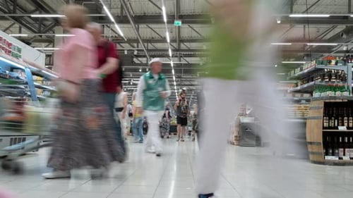 Timelapse grocery supermarket. Crowd of buyers people with shopping carts
