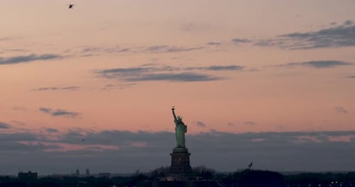 Statue of Liberty, Center-framed, Under Bold Pink Sky