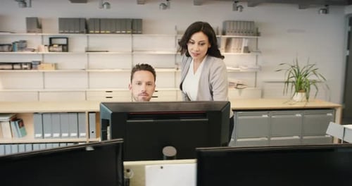 4k video footage of a diverse group of businesspeople sitting and working in an office