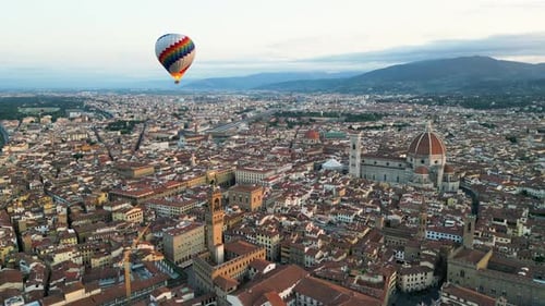Colorful Hot Air Balloon Epic Flying Above Florence at Sunrise Italy