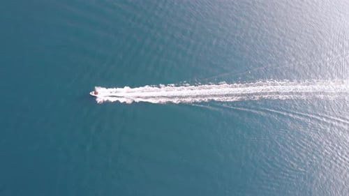Aerial View of Floating Boat on Blue Adriatic Sea at Sunny Day