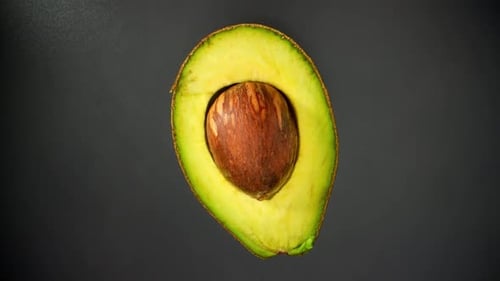 Half avocado macro video. 4K