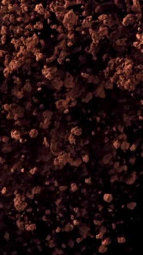 The Cocoa Powder Flies Up and Down Filmed on a Highspeed Camera at 1000 Fps