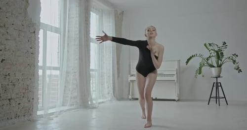 Arabesque Classical Ballet Dancer Side View Beautiful Graceful Ballerine in Black Practice Ballet