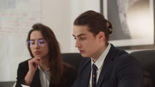 Man Presenting at a Business Meeting