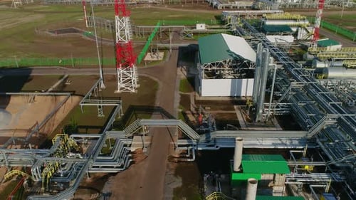 Gas and Oil Refinery Complex with Pipes and Towers Aerial