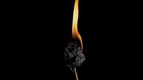 Burning Ember Flame on Black Background