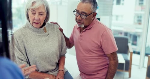 Elderly couple, tablet and doctor with brain x ray, MRI scan or cancer results in healthcare clinic