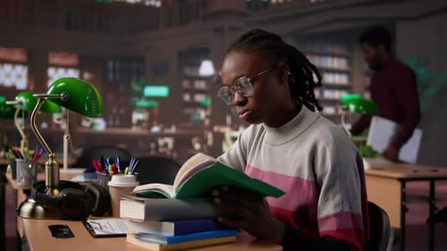 Female Pupil Struggling to Stay Focused and Awake While Researching