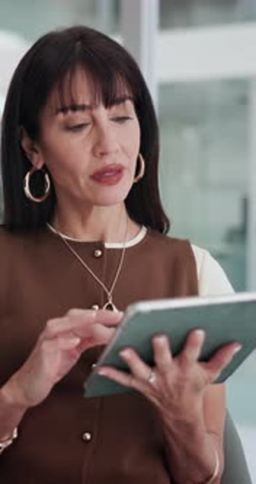 Thinking, office and business woman on tablet for newsletter, article and feedback for online