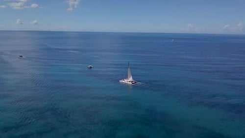 Aerial View of Catamaran Sailing in Caribbean Sea