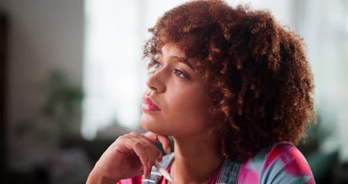 Woman Thinking with Hand to Chin Close Up