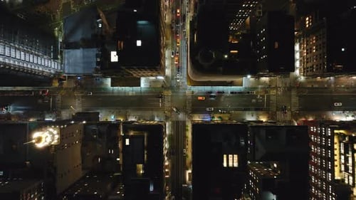 Bustling Manhattan Intersection Comes Alive at Night Yellow Taxi Cabs Navigating Vibrant Streets