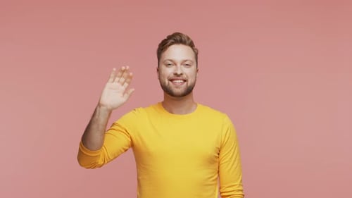 Expressive Young Man Over Vibrant Background Studio Portrait of Handsome Person
