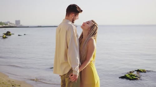Couple Embracing on Beautiful Beach at Daytime