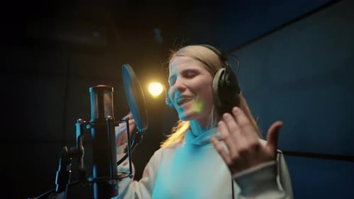 Woman Singer Recording Soundtrack in Modern Studio Talented Vocalist Singing Portrait of Young Adult