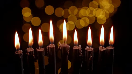 Celebrating Hanukkah With a Traditional Menorah and Festive Candles