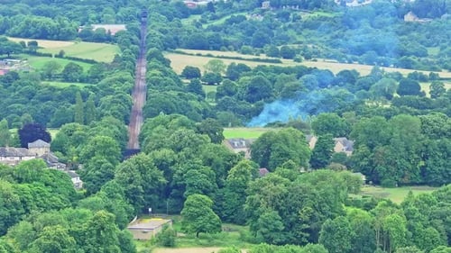 Rolling Green Hills and Railway Tracks