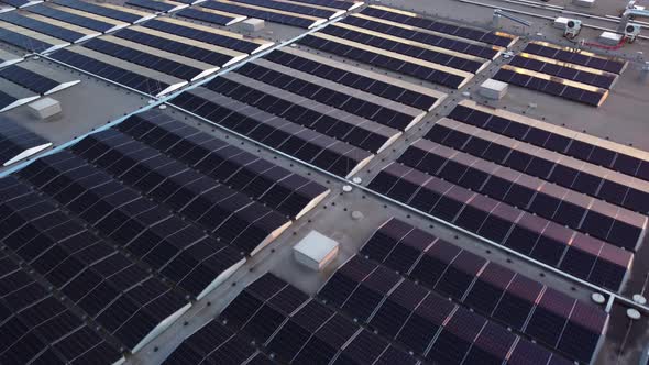 Aerial fly a rooftop of solar panels, energy renewable grid, HVAC ...