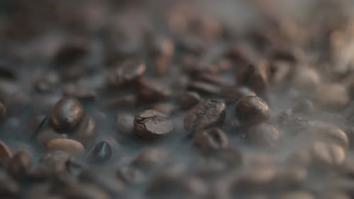 Close up of coffee beans with smoke