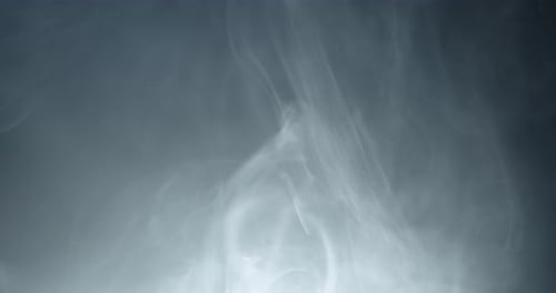 Abstract Swirling White Smoke Rising on Gray Background