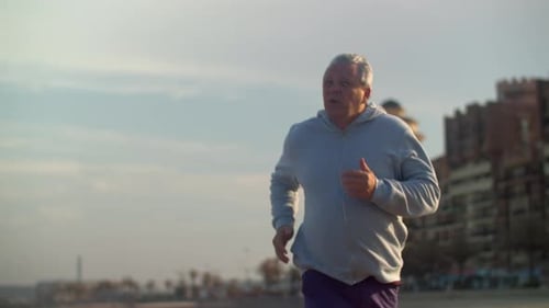 Senior Man Having Everyday Jogging Training