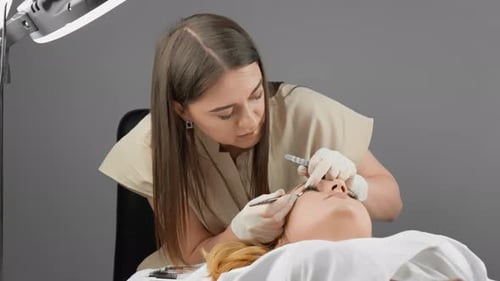 Eyelash Extension Procedure is Performed in Stylish Salon Where Women Find Pleasure in Caring for