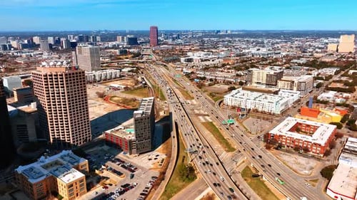 Lively traffic on the highways of American uptown at daytime. Scenic view of Dallas, Texas, USA
