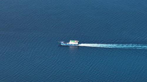 Cargo Vessel Over the Blue Sea in the Philippines