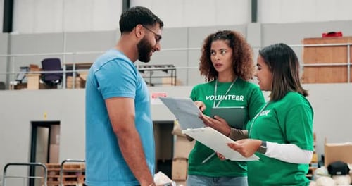 Volunteer, group and people in warehouse on checklist for donation, inventory discussion