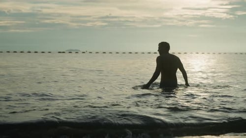 Contemplative Ocean Scene Silent Man Faces Tranquil Sea Reflective Individual Traverses Peaceful