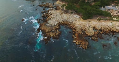 Rocky coastline of Carmel Highlands aerial view. Pacific ocean coastline landscapes.