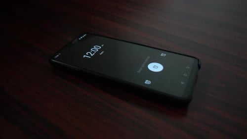 Alarm Ringing in Phone. As the clock is running and it is the alarm time, so the processor sends a s