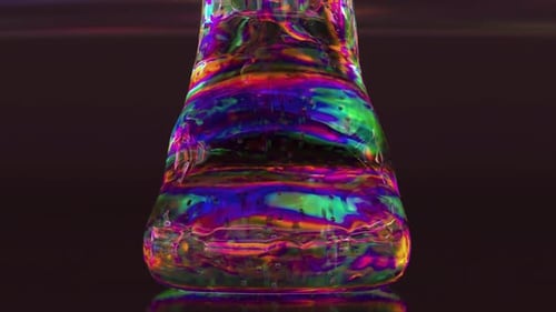Abstract Iridescent Liquid Swirling in a Conical Flask