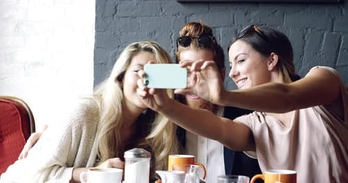 4k video footage of a group of friends catching up at a cafe together