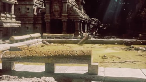 Ruines d'un ancien temple de pierre au Cambodge illuminées par les rayons du soleil