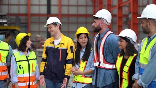 Team of Engineers and Professionals Workers in Heavy Industry Manufacturing Factory. Team of workers