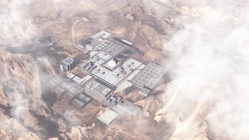 Secret Nuclear base hidden in the desert with mountains, Aerial