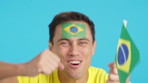 Close Up of a Man Supporting Brazilian Team