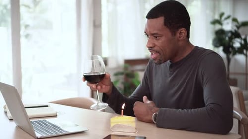 Adult Man Celebrates Birthday with Video Call At Home
