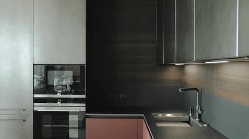 A Sleek Modern Kitchen Design That Inspires Cooking Enthusiasts and Home Decorators Alike